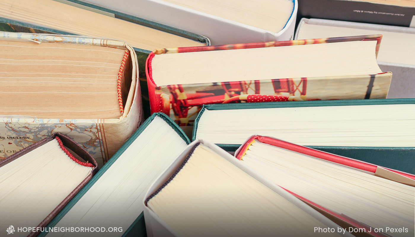 A photo of the tops of books to represent books you can recycle and reuse